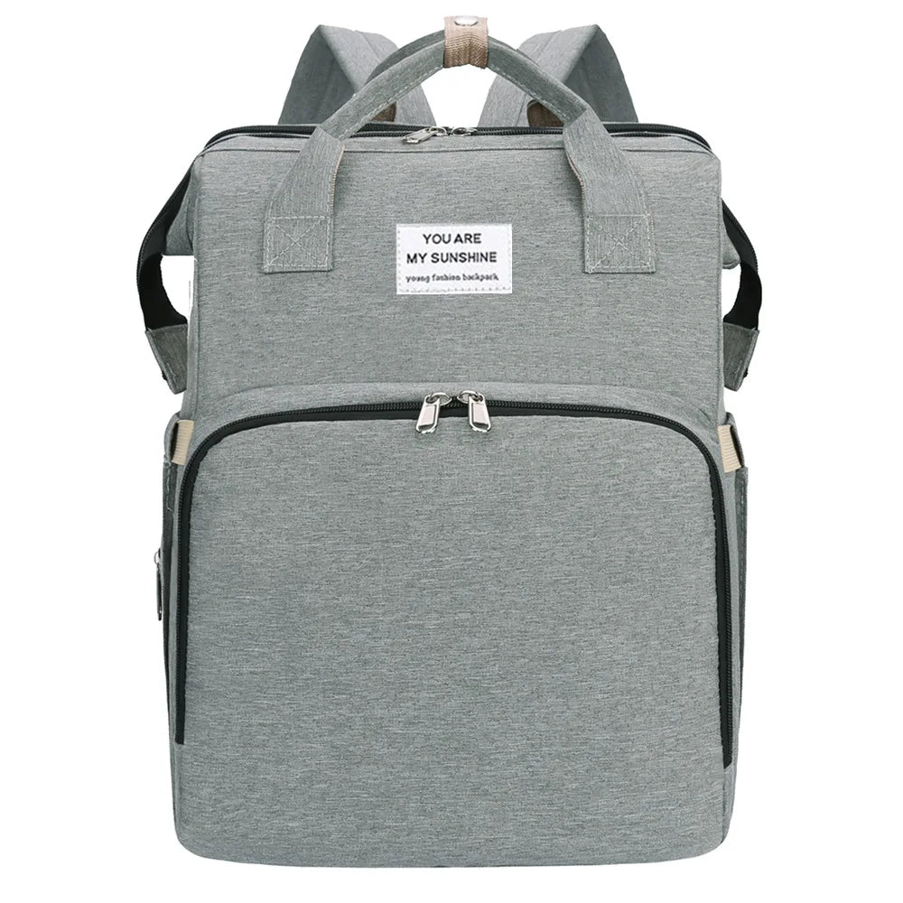 Portable folding crib, mommy bag, multi-functional, lightweight and large-capacity leisure bag, double shoulder mother and baby bag.